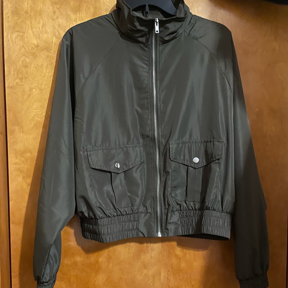 Army green wind breaker